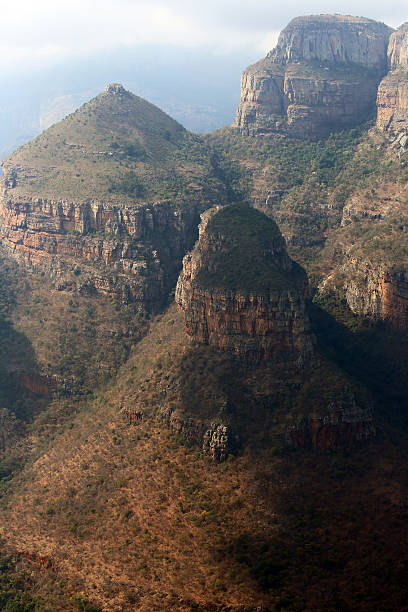 South Africa: Blyde River Canyon Part of the Three Rondavels in Blyde River Canyon, one of the largest canyons on earth and the largest 'green canyon'. Part of South Africa's famed Panorama Route, the canyon forms the northern part of the Drakensberg escarpment. blyde river canyon stock pictures, royalty-free photos & images