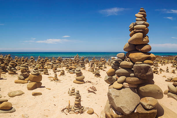 Cairns (rock stacks) along the Great Ocean Road Tons of mysterious cairns, or rock stacks, near Wongarra, along the Great Ocean Road, Victoria, Australia. cairn stock pictures, royalty-free photos & images