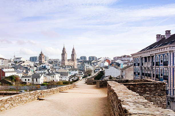 Roman wall and cathedral in Lugo, Galicia, Spain Lugo urban skyline, townscape seen from the pedestrian walkaway on top of the roman "muralla" an UNESCO world heritage site, cathedral in the background. camino de santiago photos stock pictures, royalty-free photos & images