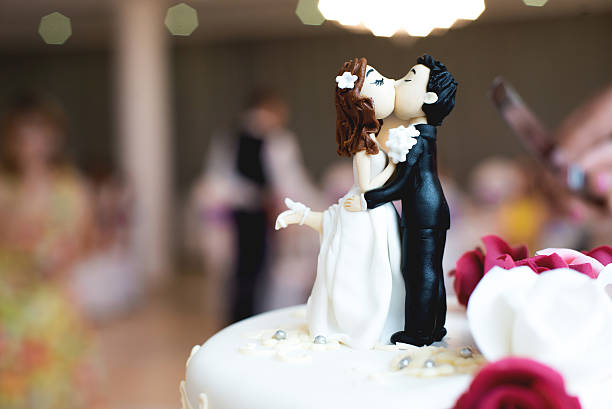 Beautiful chocolate figurines on top of wedding cake