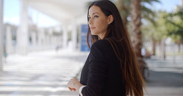 istock Beautiful Business Woman Standing and Looking 501420436