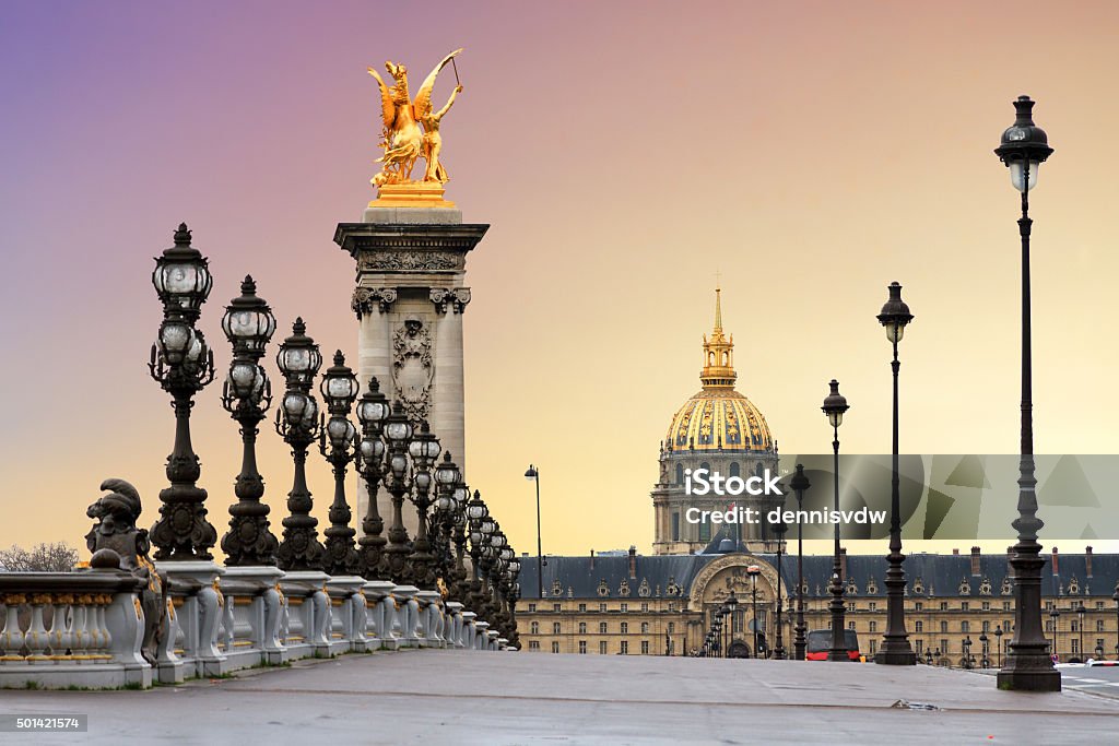Pont Alexandre III sunrise Beautiful sunrise at the Pont Alexandre III and Les Invalides in Paris Paris - France Stock Photo
