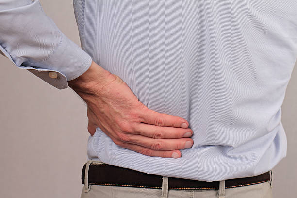 istock Close up of business man holding his lower back. 501422298