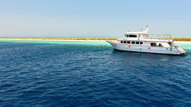 istock Yacht anchored red sea 501422992