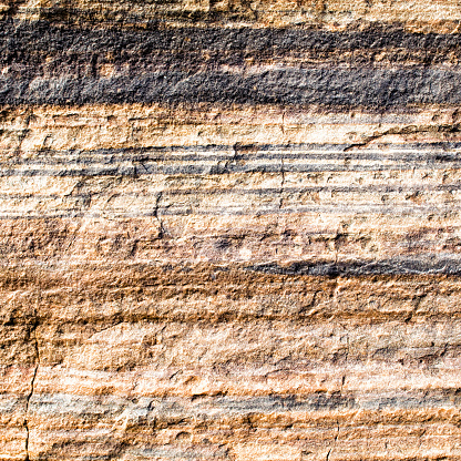 An Australian cliff face showing rock strata laid down over time.