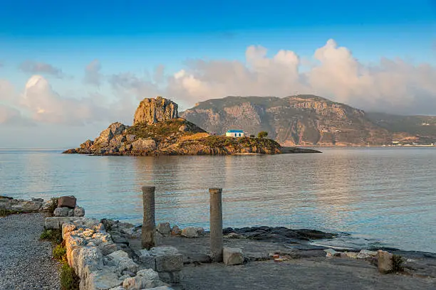 View on little island Kastri near Kos in Kamari bay, Greece
