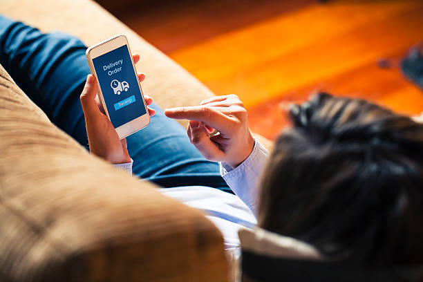 istock Woman using on line tracking in a mobile phone. 501425426