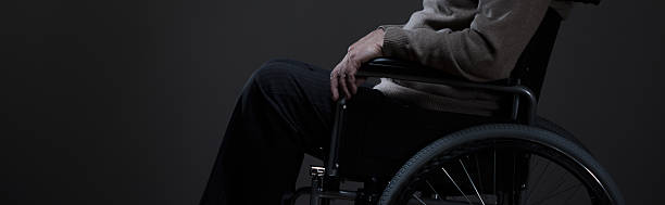 istock Person sitting on a wheelchair 501427302