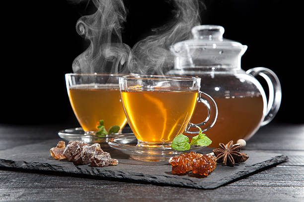 istock Cup of tea on dark background 501429740