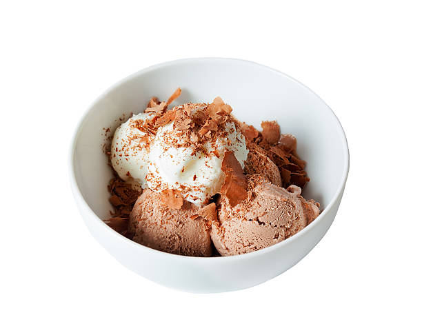 istock Scoops of vanilla and chocolate ice cream  isolated. Selective focus 501430522
