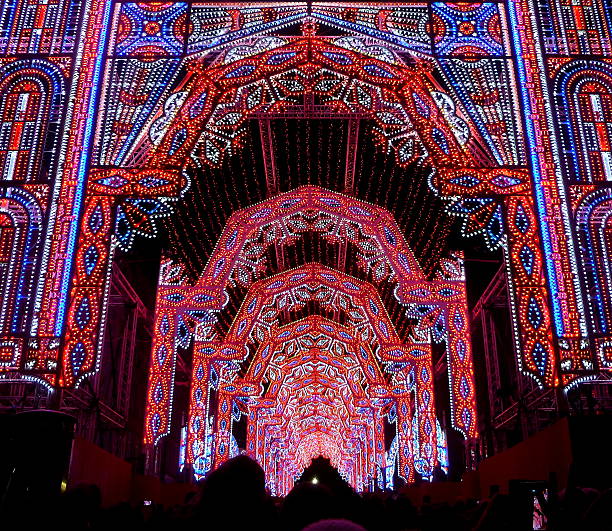 The center of Edinburgh in bright, vivid Christmas lights. People milling around enjoying the festive scene, taken on the Run up to Christmas, winter 2015, Scotland.