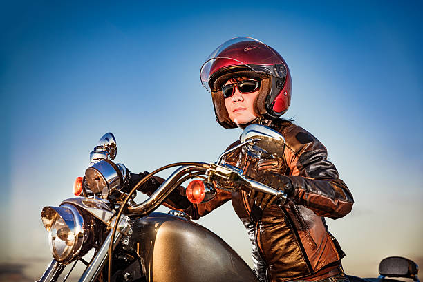 istock Biker girl on a motorcycle 501431016