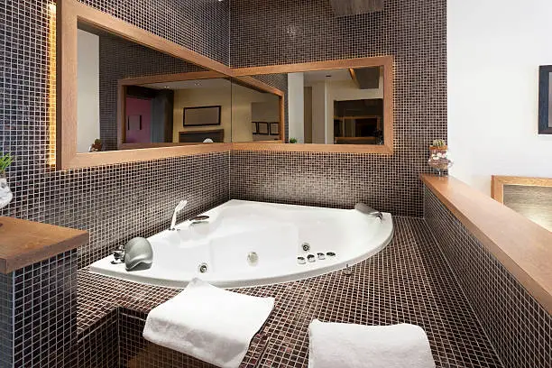 Photo of hot tub in hotel room interior