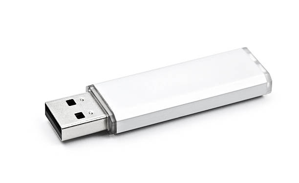 memoria flash usb aislado sobre un fondo blanco - usb memory fotografías e imágenes de stock