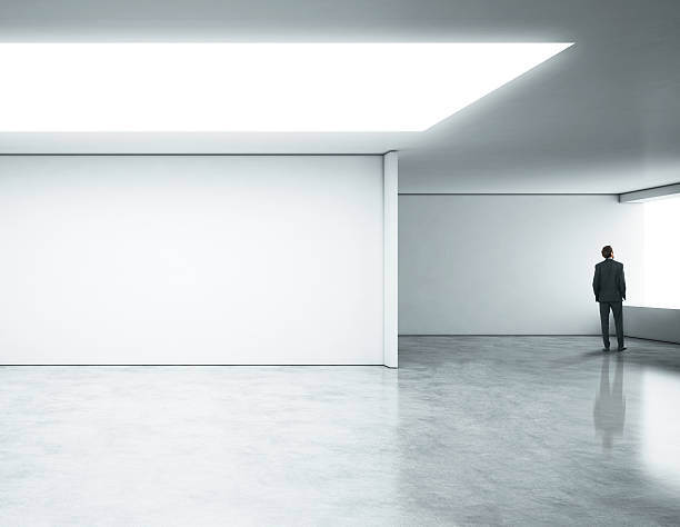 istock Young businessman standing in bright office 501446977