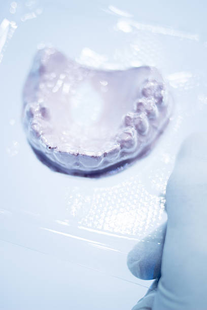 istock Dental mold dentists clay teeth ceramic plate cast 501452722