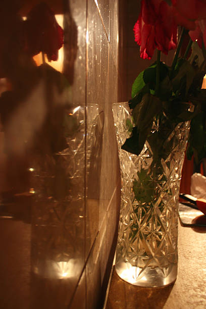 istock Red rose in crystal vase 501453720