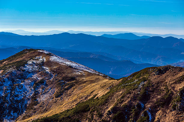 istock Winter Mountain View with Foggy Remote Ridges 501453820