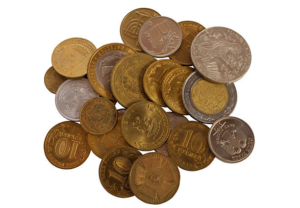Lots of coins of different countries on a white background