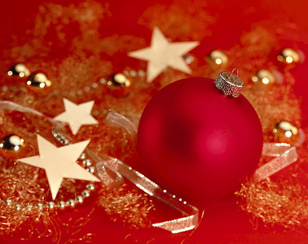 Red Christmas ball with gold stars