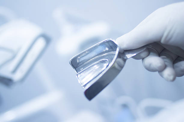 istock Dental mold dentists teeth ceramic plate cast 501455956