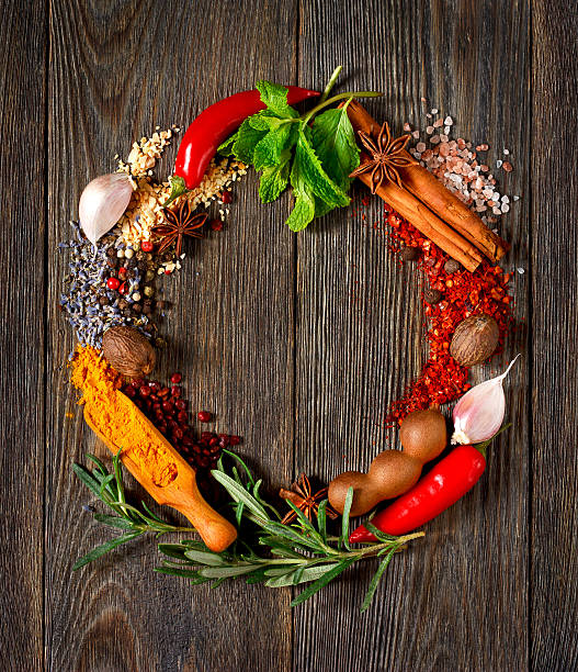 istock Spices and herbs on wooden table. 501458808