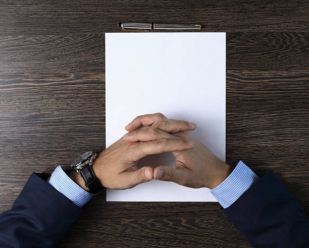 istock businessman seated at the table 501477586
