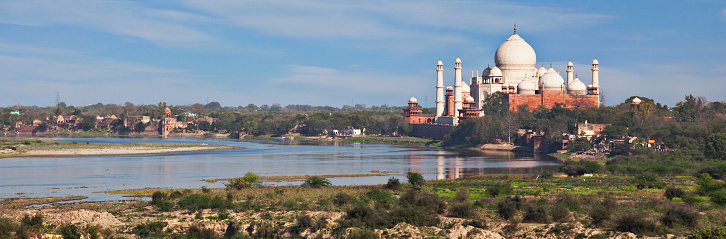 Panoramic of the Taj Mahal and Yamuna River in Agra, India.