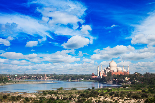 The Taj Mahal and Yamuna River in Agra, India.