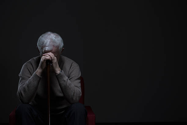 Elder man with depression stock photo