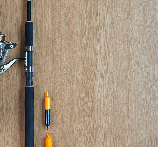 istock Abstract fishing background with rod, reel and floats, text space. 501482100