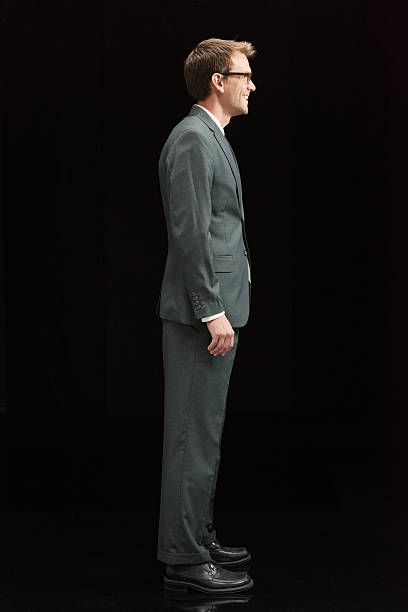 istock Smiling businessman looking away 501482754