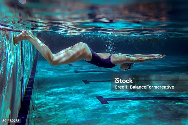 Female Swimmer At The Swimming Pool Stock Photo - Download Image Now - Swimming, Swimming Pool, Indoors
