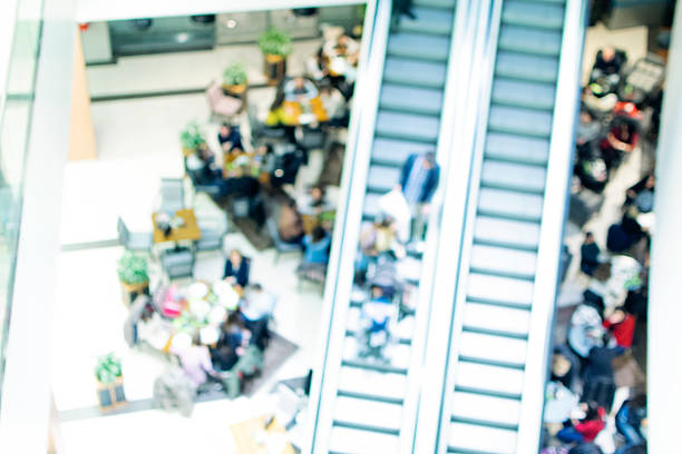istock Blurred People Rushing in Shopping Mall 501483464