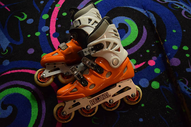 istock Rollerblades Orange And Grey Inline Skates Rental 501487790