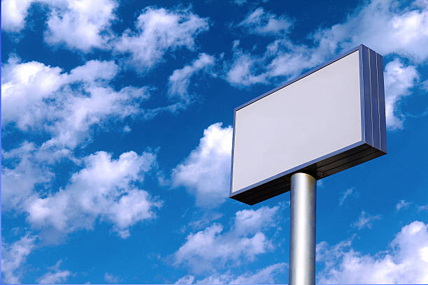 istock Blank billboard against blue sky, put your own text here 501489228