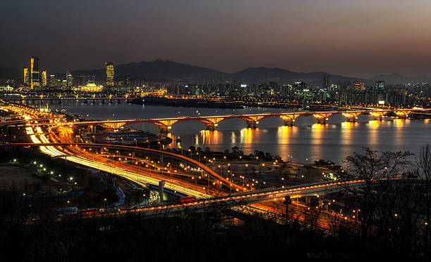 istock Night traffic over han river in seoul 501492012
