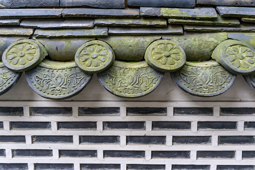 traditional and historical korean hanok tiles in bukchon hanok village in seoul, south korea.