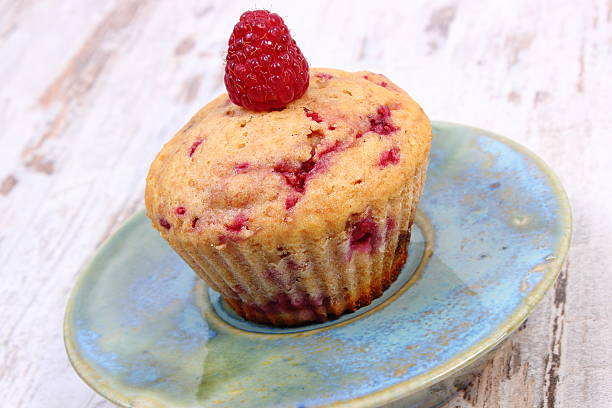 istock Fresh baked cupcake with raspberries and chocolate, delicious dessert 501505132