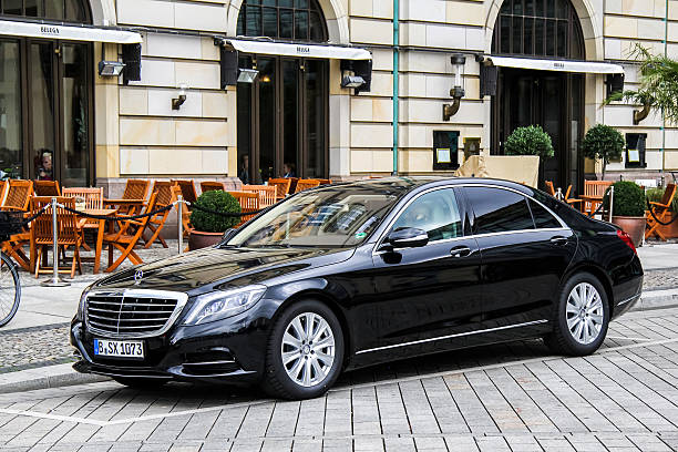 Odesa, Ukraine - July 21, 2012: Limousine by Mercedes brand decorated for wedding near restaurants on the street of the city