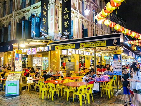 Singapore, Singapore - August 12, 2015: chinese people go eating in the evening in chinatown in Singapore . In 2014, 74 percent of the  Singapore population were chinese ethnic.