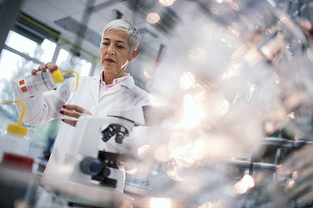 istock Female forensic scientist working on chemicals in laboratory. 501508856