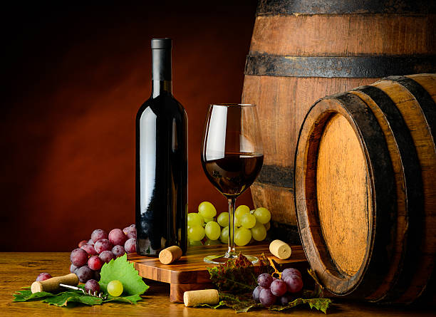 istock red wine bottle and glass 501509142