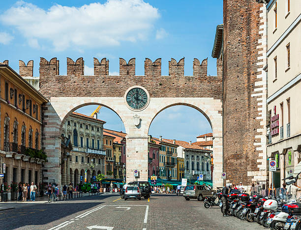 Verona, Italy - August 5, 2009: people enjoy walking at Piazza Bra in Verona. This place was in roman times a meadow , the Pratum in front of the arena di Verona.