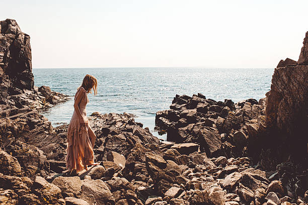 istock Beautiful woman by the ocean 501509839