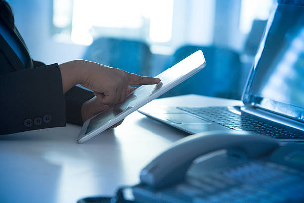istock Businessman checking business reports on digital tablet 501510152