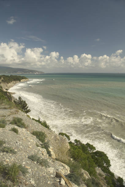 istock Seascape with a rocky shore, with blue sky and clouds 501510539