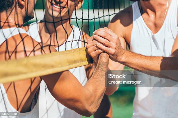 Beach Volleyball Teams Congratulating After The Match Stock Photo - Download Image Now