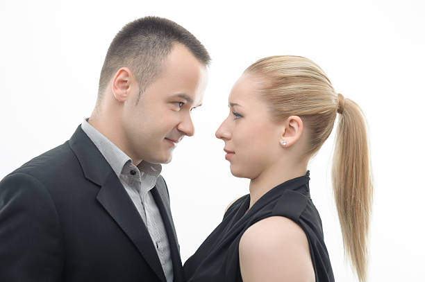 istock Colleagues shouting against each other on white background 501512337