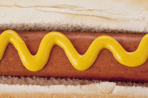 istock close up image hat dog sandwich with mustard 501512490